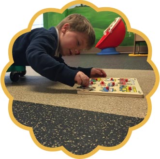 Boy doing a puzzle